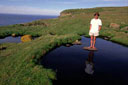 Haensel, Man on islet on Handa island Scotland.