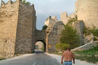 Bare chested man, infront of Golubac Fortress, Serbia, Danube.