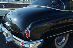 Black vintage Buick stern.