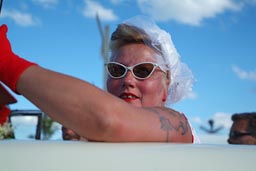 Tattooed lady driver in American Vintage Car in Vasteras Power Bigmeet, Sweden.
