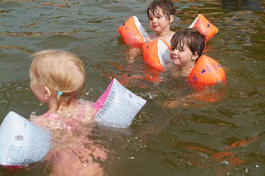 Swimming with the girl.