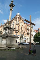 Orthodox Piety. Woman kissing crucifix. L'viv, Ukraine.