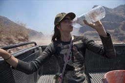 C. suffering of nausea on back of pick-up truck down the road to Batopilas.