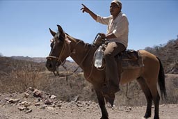 Man on horse gives directions, Urique Canyon.
