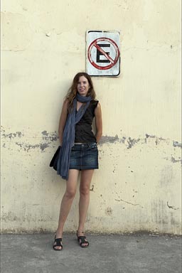 C. and short skirt, San Blas, Nayarit. No-parking sign.