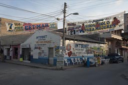 Street corner, San Blas. Taco stand opening for evening.