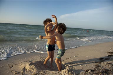 Progreson beach, boys get the ocean.