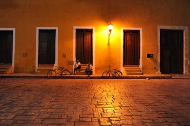 Olds on street, after hot day. Izamal, Yucatan.