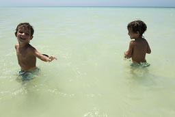 Chase me in blue water, twin boys, Colorada Beach.