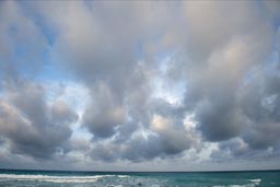 Turquois water, Cancun coast. Evening clouds.