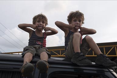 My boys on top of van are reluctant to come down.