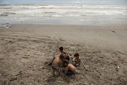 3 Mexican, 2 Austrian boys on Beach.