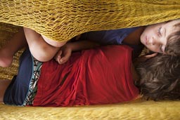 Asleep in a hammock. Boys sleep in Zipolite.