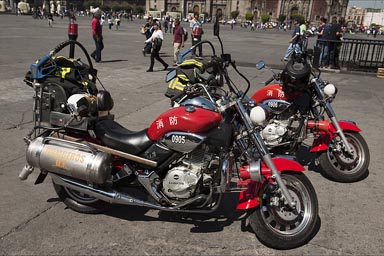 Fire fighters, motor bikes, Mexico City.