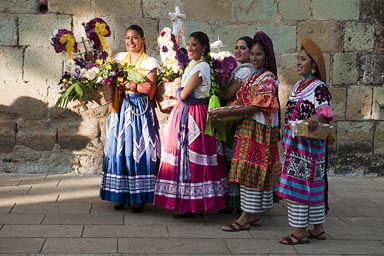 Girls and flower baskets, Oaxaca.