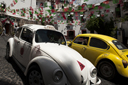 Yellow and white Vochito. Volkswagen beetles in Taxco, Mexico.