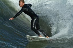 Surfer in wetsuit.