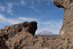 Sajama behind bizarre rocks, Bolivia.