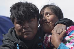 Terribly drunk hugging woman, Coipasa, Bolivia.