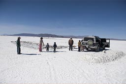 Family working on the salt flats of Coipasa, to break salt.