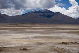 Is muddy after the rains, crossing will not be easy, where? Bolivia altiplano volcano and plains.