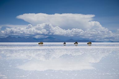 Yellow Czech trabis and a yellow motor cycle, Uyuni Salares, Bolivia.