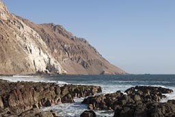 Rocks, brown and white coatsline, Chile..