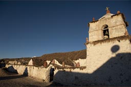 Late sun and a bit of shade, deep bleu sky on Parinacota white church, up on 4,600m, Northern Chile, 