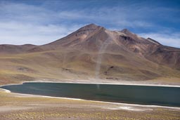 Sand twister fades away over Laguna Miniques. 