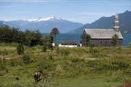 Cochamo, church, pastures, horse and bay.