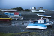 Contao pebbles beach, cloudy morning, boats.