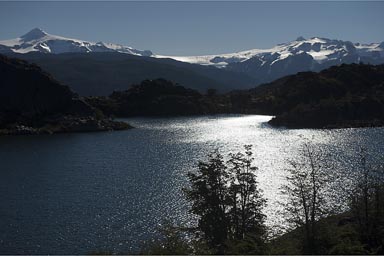 Small Los Patos Lake far in back against late sun, South Patagonian Ice field.