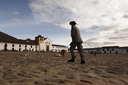 Man and hat on main square of Villa de Leyva, Colombia.