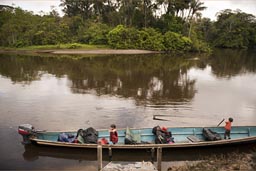 Boys play in our boat on Cuyabeno River.