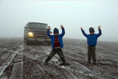 Snow and fog, black volcanic sand and pebbles, this is Chimborazo.