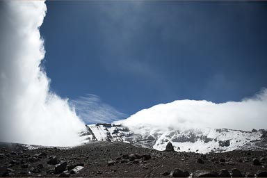 Chimborazo open in blue skies, before the next wave of clouds.