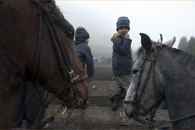 My twin boys, right in the middle of horses fiesta, Salinas de Guaranda.