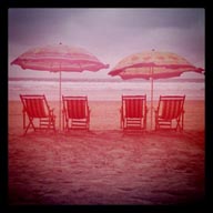 Deck chairs and parasols, in Montanita beach, Ecuador.