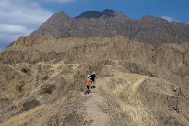 The boys hike up the ramp in Pampa Grande.