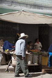 And a man with sombrero walks by. Cutervo, Peru.