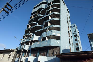 Blue concret high rise, a ruin in Iquitos.