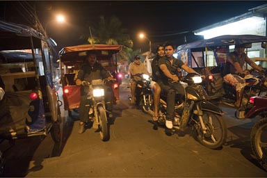 Nightly auto rickshaw, motor cycle taxi ride home, Iquitos Peru.