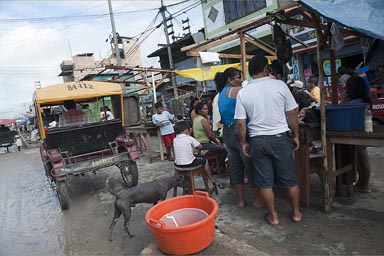 Market in Iquitos, from a rickshaw taxi.