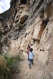 Boys underneath Karajia, Chachapoyas.