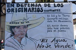 Conga mine protest, Cajamarca poster shows Indigenas woman and hat with Conga no va. El Agua no se vende.