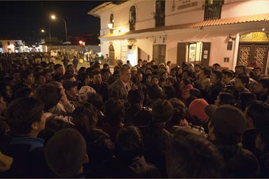 Evening crowd of Conga mine protesters, a guy speaks.