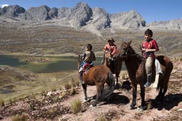 Andino riders, laguna, Cordillera Blanca rocky mountains, Peru.