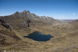 Cordillera Blanca deep blue laguna and rocky mountains on 4,500m of elevation, Peru.