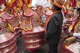 Amongst orange costumes, Lima Independence Day in Peru. 