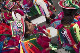 Women from Puno march and dance along parade on plaza de armas, Lima Independence Day in Peru. Women from Puno march and dance along parade on plaza de armas, Lima Independence Day in Peru.
